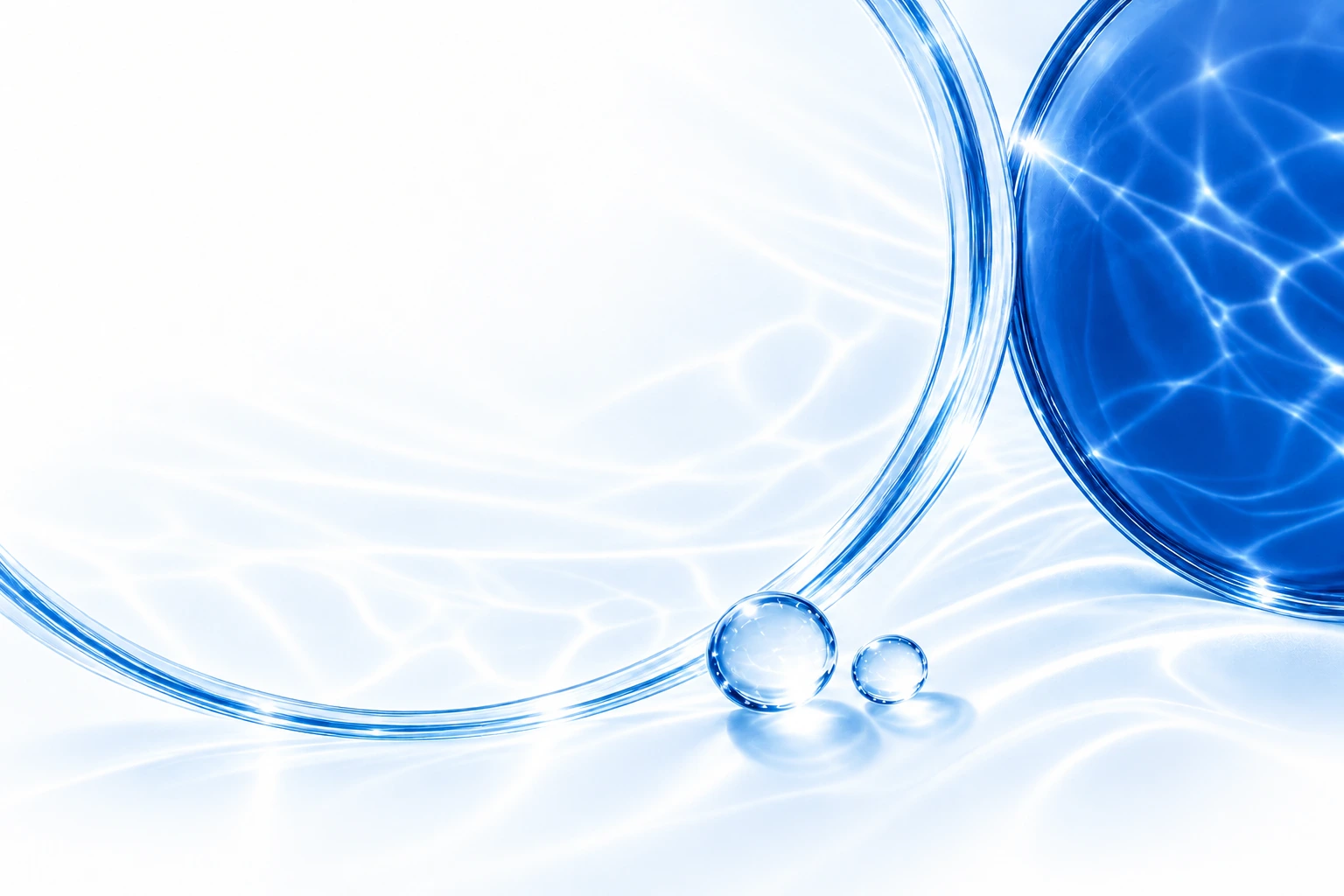 Transparent glass arcs and droplets in ice blue and cobalt